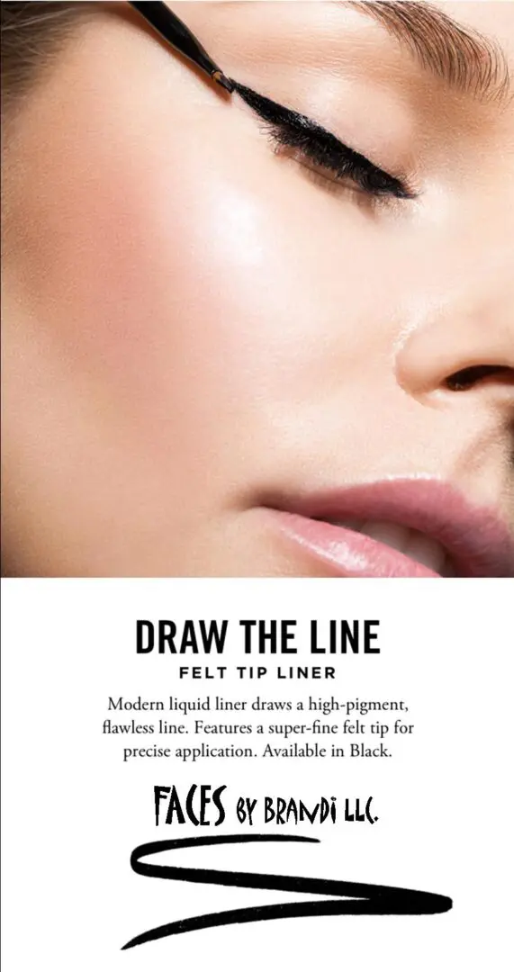 Close-up of a woman applying eyeliner.