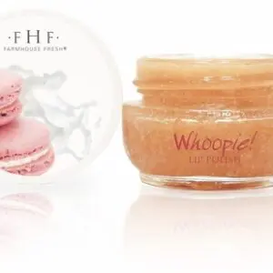 Hf whipped cream with macaroons and a bottle of milk.