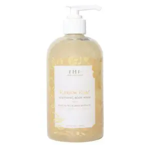 A bottle of Farmhouse Fresh Rainbow Road Body Wash and Bubble Bath with a flower on it.