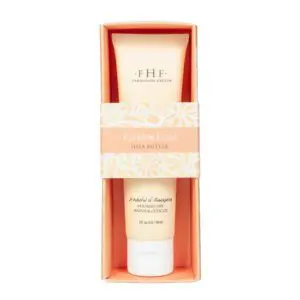 A tube of Farmhouse Fresh Quinsyberry Body Oil in a white box.