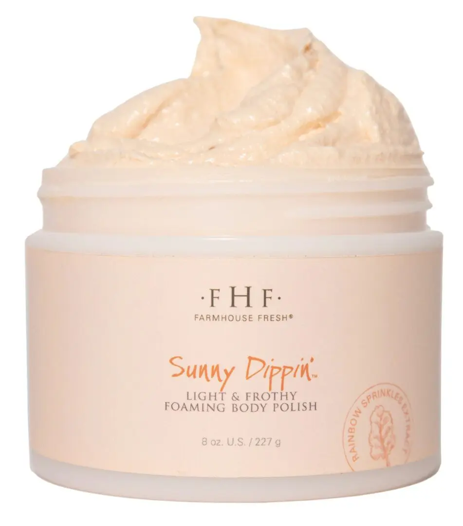 A jar of FHF Sunny Dippin' Foaming Body Polish on a white background.