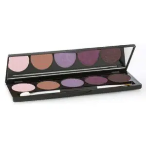 Purple and mauve eyeshadow palette with brush.