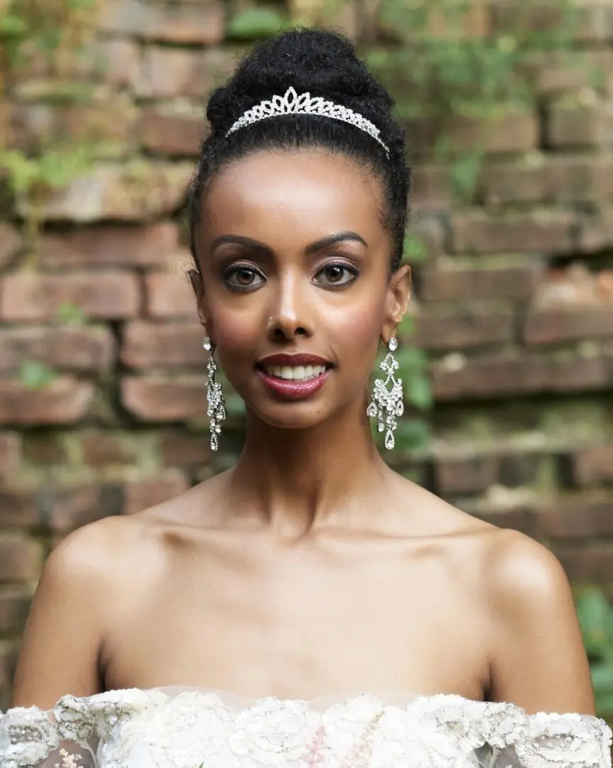 Bride with tiara and earrings.