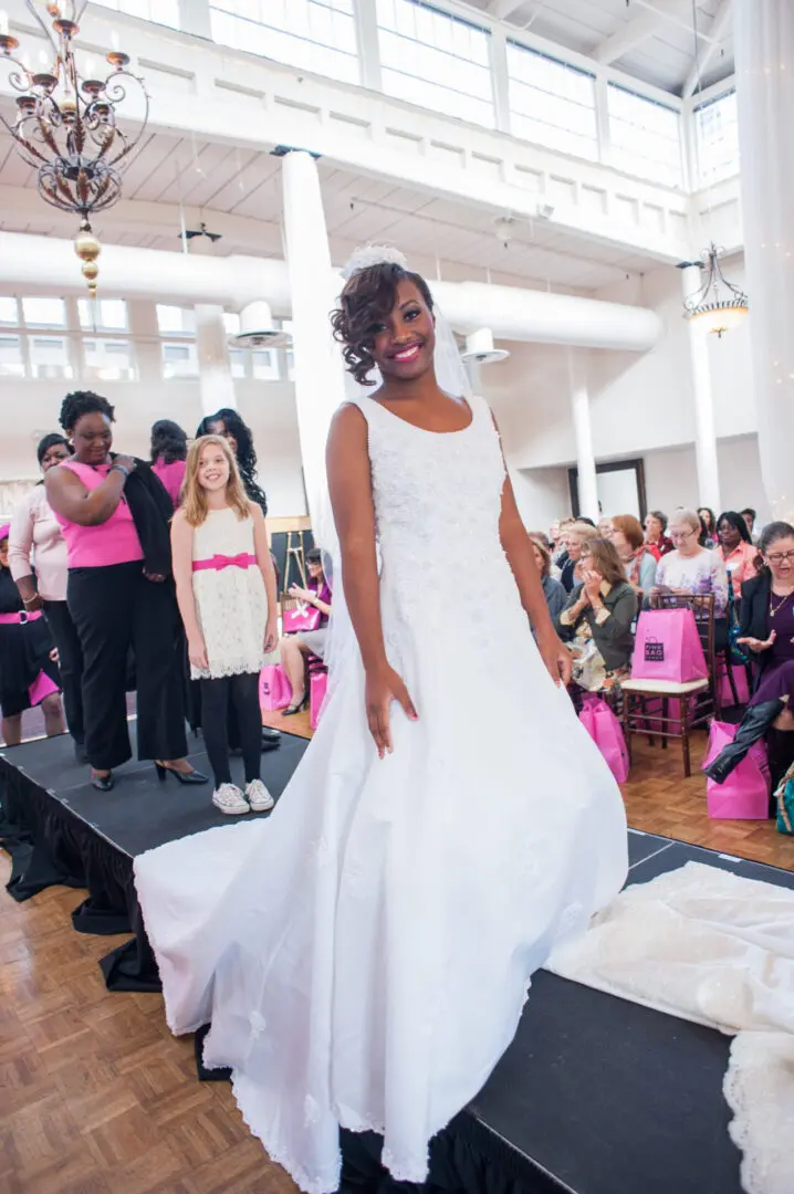 Bride in long white wedding gown.