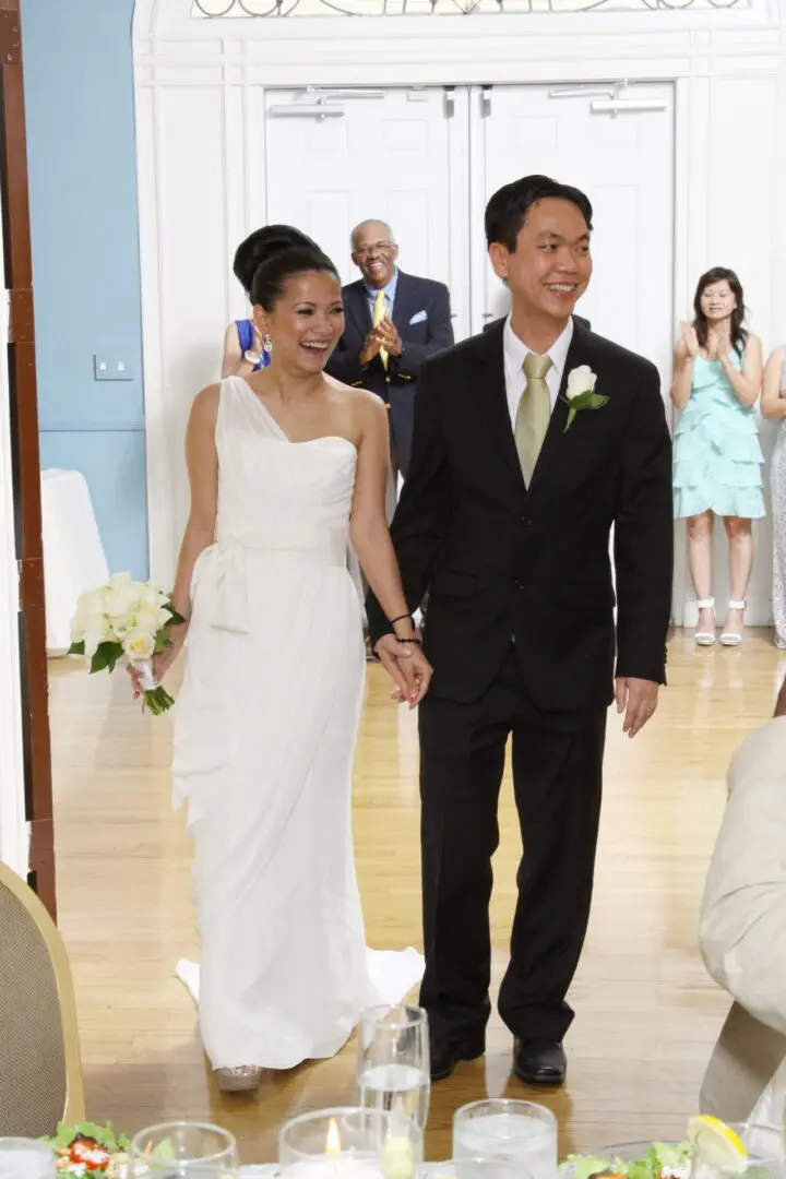 A Bride and groom exiting wedding ceremony.