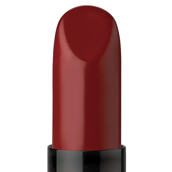 Red lipstick in black tube, close-up.