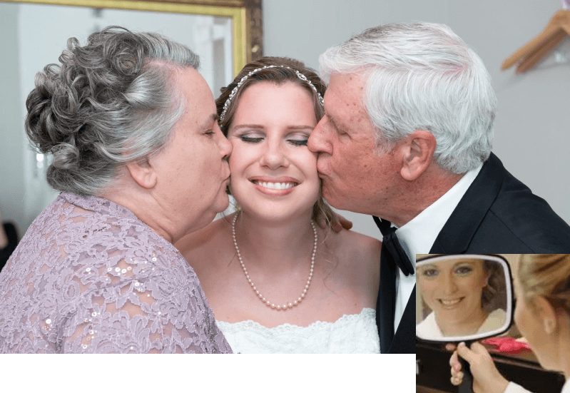 Bride with her parents at wedding