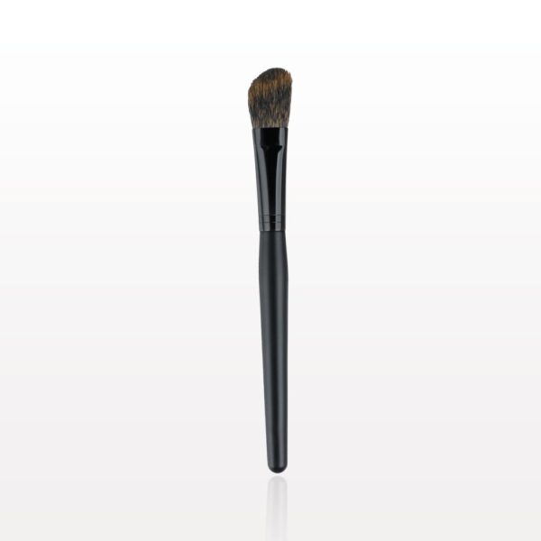 A black makeup brush on a white background.