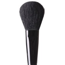 A black makeup brush on a white background.