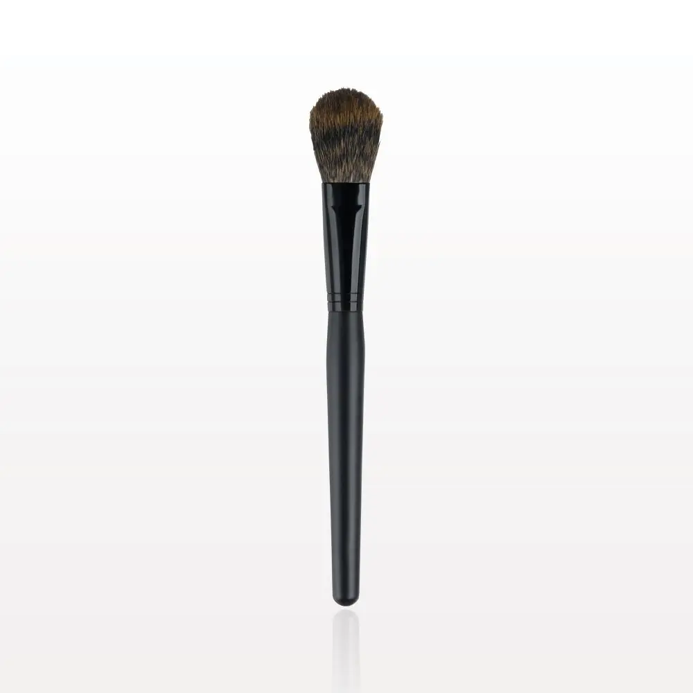 A black makeup brush on a white background.