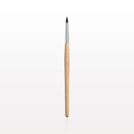 A FACES by Brandi Lip Brush with a wooden handle on a white background.