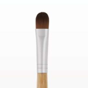 A makeup brush with a wooden handle on a white background.
