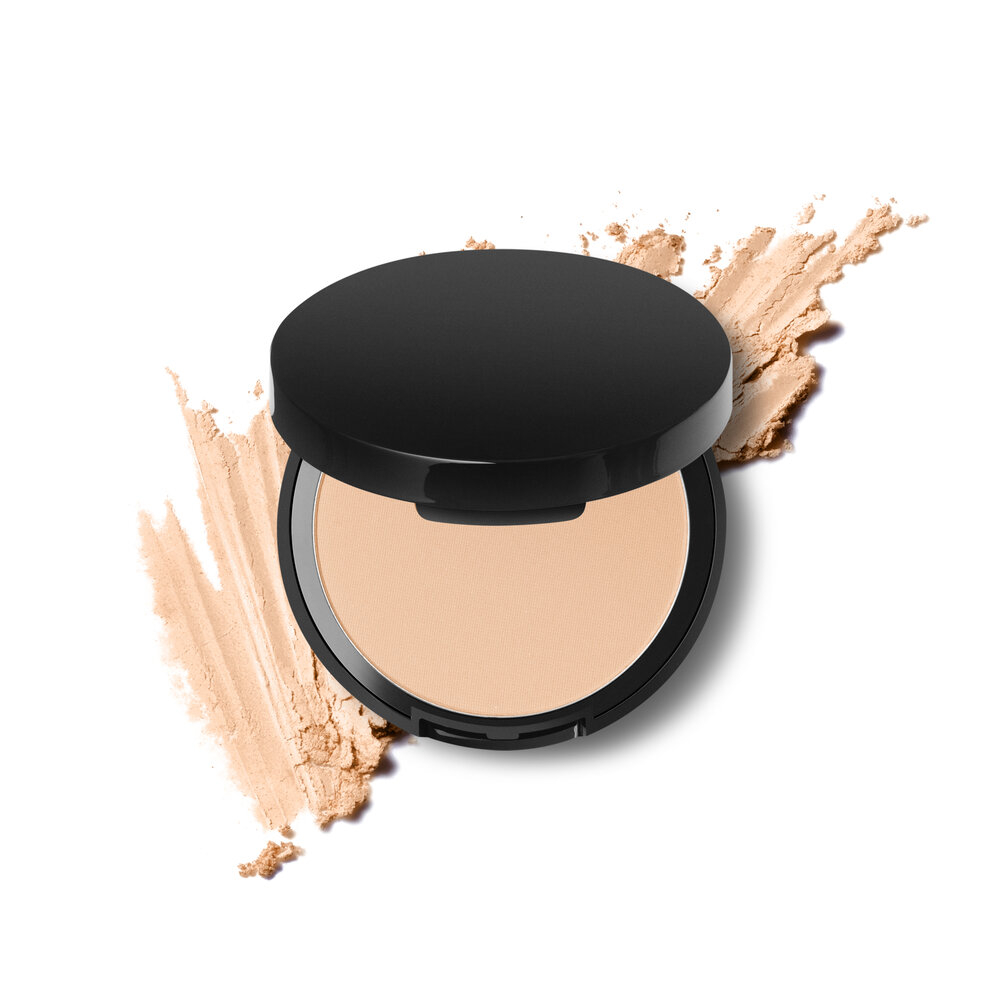 A pressed powder foundation on a white background.
