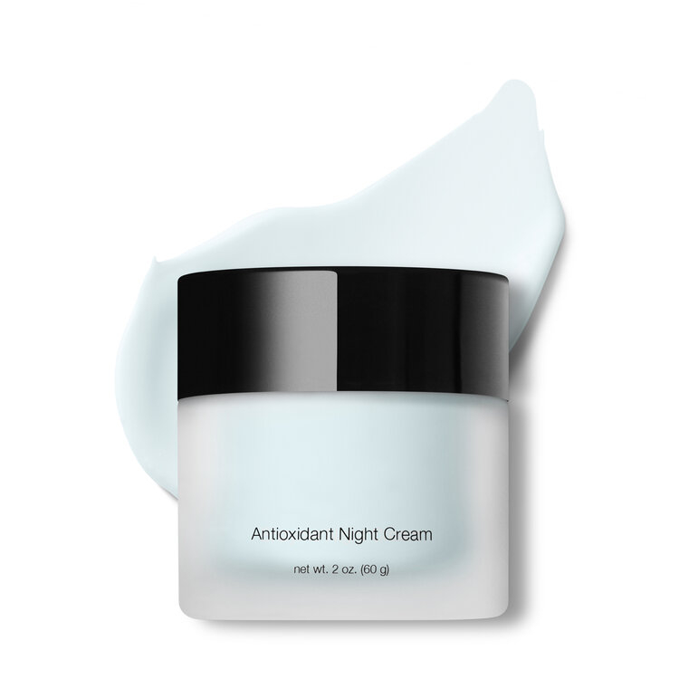 An apricot night cream on a white background.