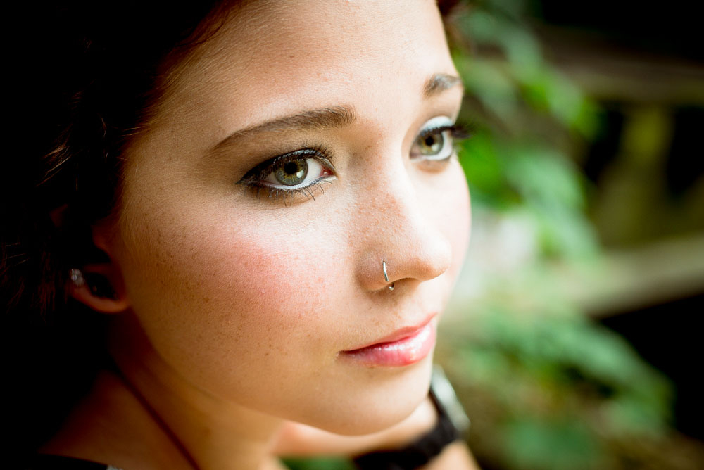 A woman with a pierced ear.