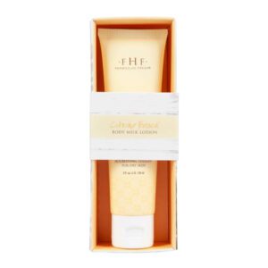 A tube of Farmhouse Fresh Citrine Beach Body Milk Hand Lotion in a white box.