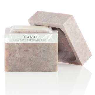 Earth soap bar in a white box.