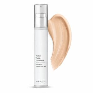 Foundation bottle with beige makeup smear.